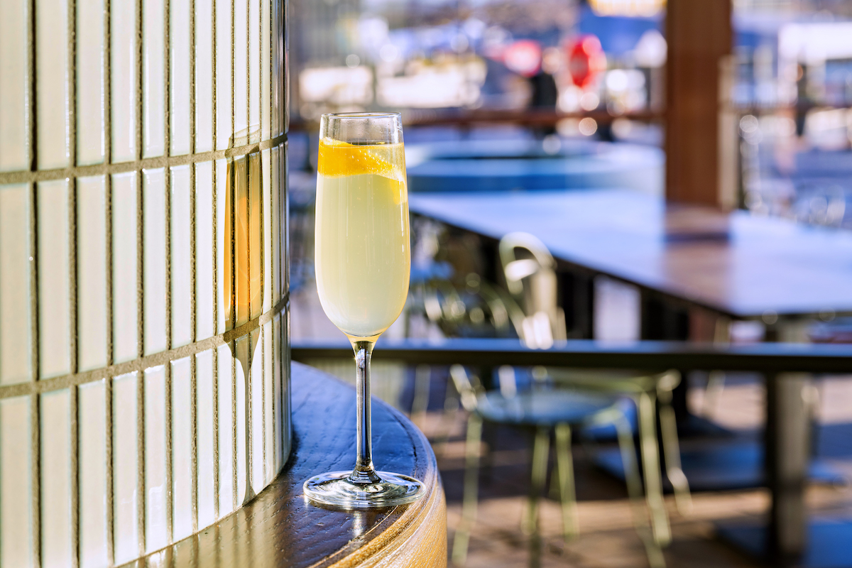 Bellinis in the waterfront wine garden at Easy Company. Photography by Daniel Swartz